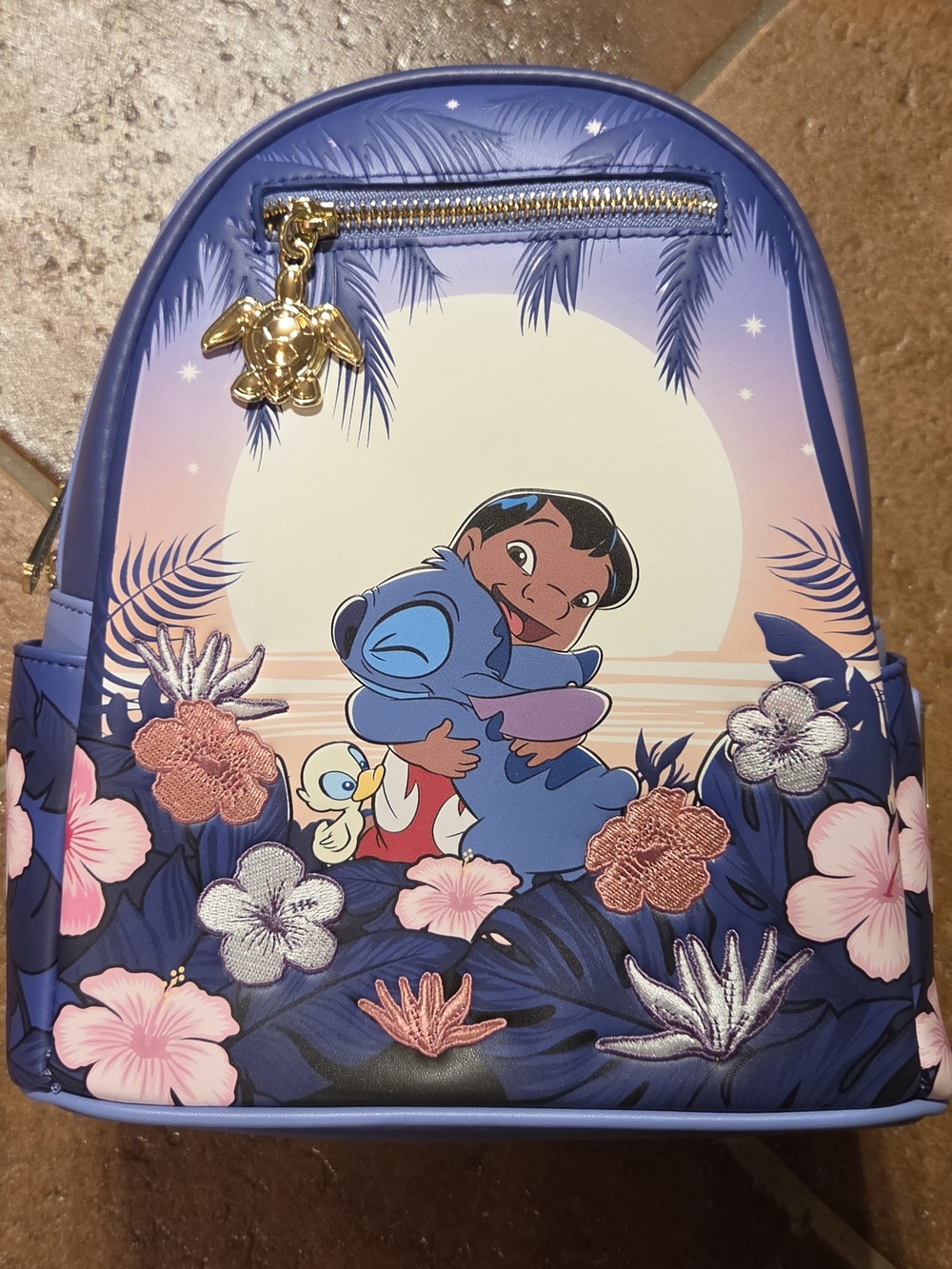 Loungefly Disney Lilo & Stitch Floral Sunset Scene Mini Backpack